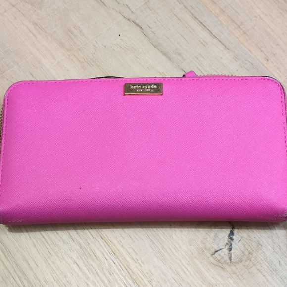 kate spade Handbags - Kate Spade Vibrant Pink Wallet. Well Loved. Has Some Wear On The Edges